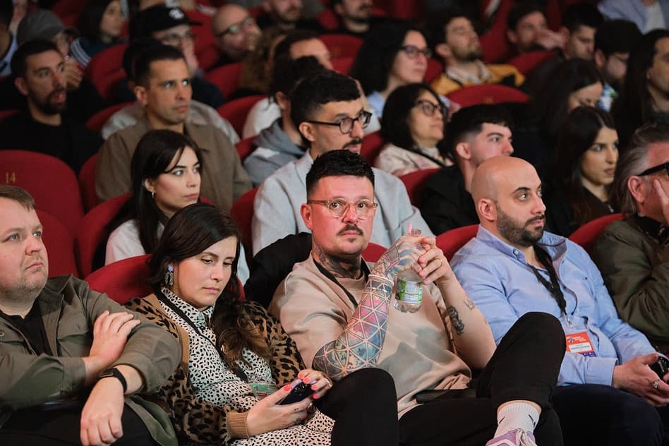 An audience seated in the auditorium during a SODA talk